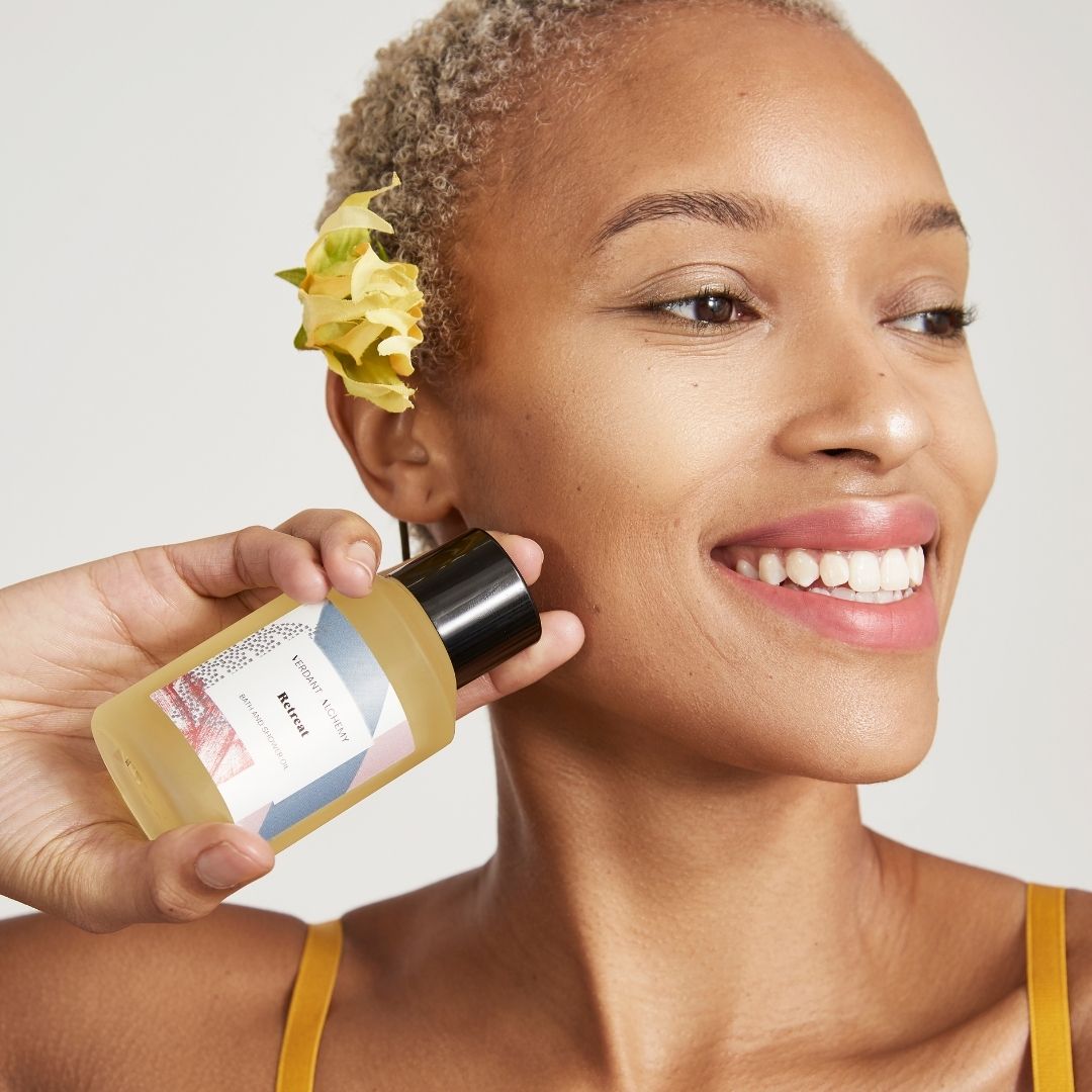 Model holding Retreat Bath & Shower Oil